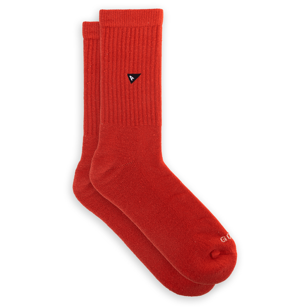 Arvin Goods crew sock in seasonal Paprika color. Made in Portugal with recycled yarns. Unisex fit.